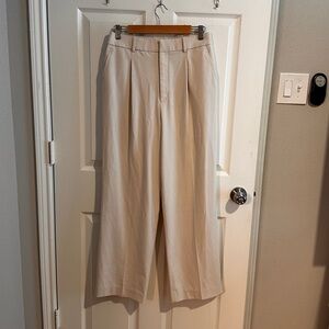 **SOLD** uniqlo cream pleated wide leg pants